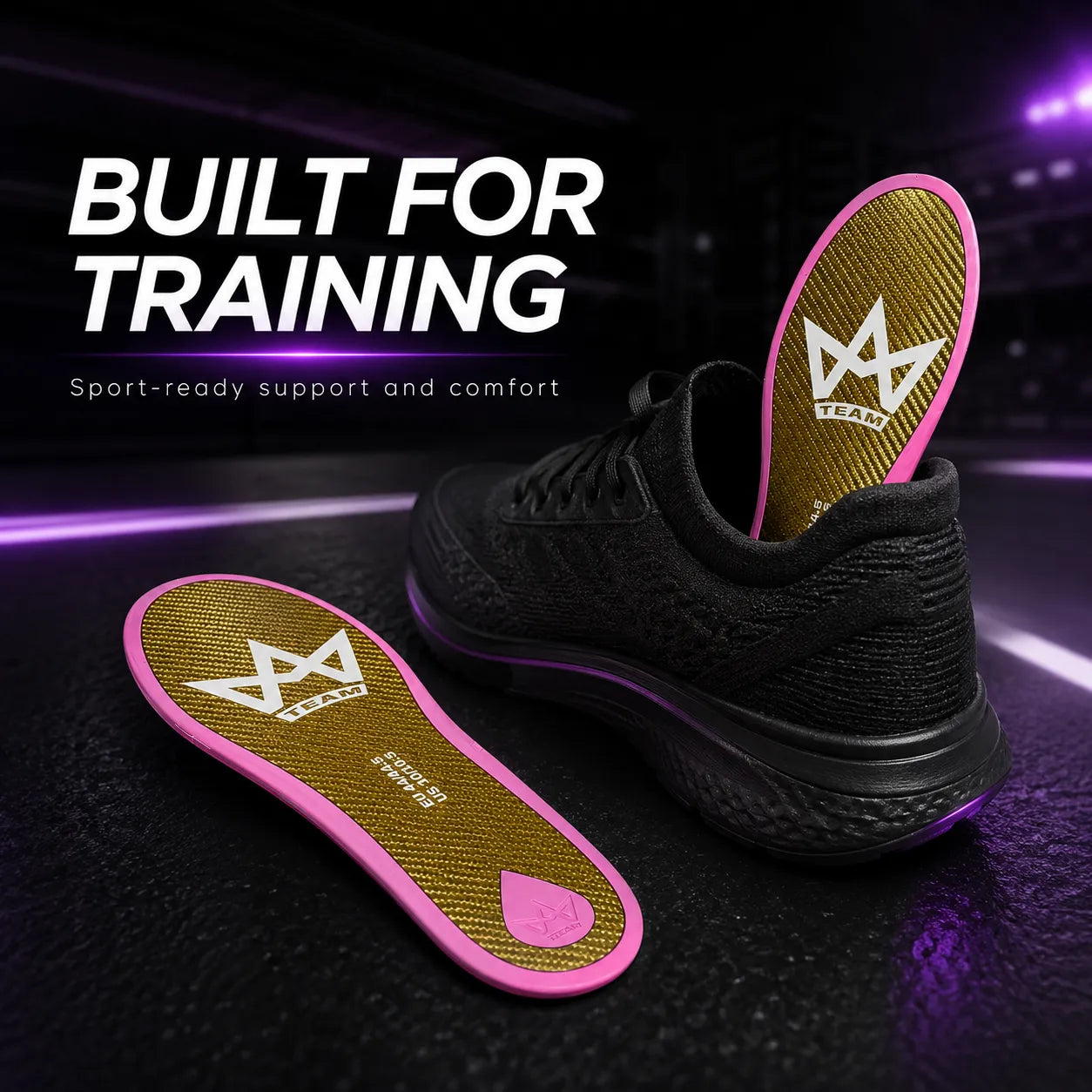 Performance insoles with pink trim and gold texture, designed for training support, shown beside black athletic shoe